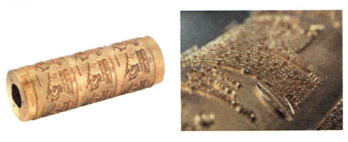 Image engraved on a rotary die. Producing rotary foiling dies requires more engineering than flatbed dies. The process includes machining the inner core, adding end caps, and integrating heated oil or electric heating.