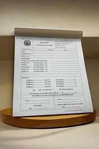 Receipt Book, 3 Sheets per Set, Plain Paper. Each book contains 50 sets. 1 set = 3 sheets.  Top sheet: white bond paper (tear-off)  Middle sheet: bank paper, available in 4 colors (pink, yellow, blue, green), tear-off  Bottom sheet: proof paper attached to the book. Numbered and book-bound. Spec: Top sheet 55 gsm bond, middle sheet colored bank paper, bottom sheet proof paper.